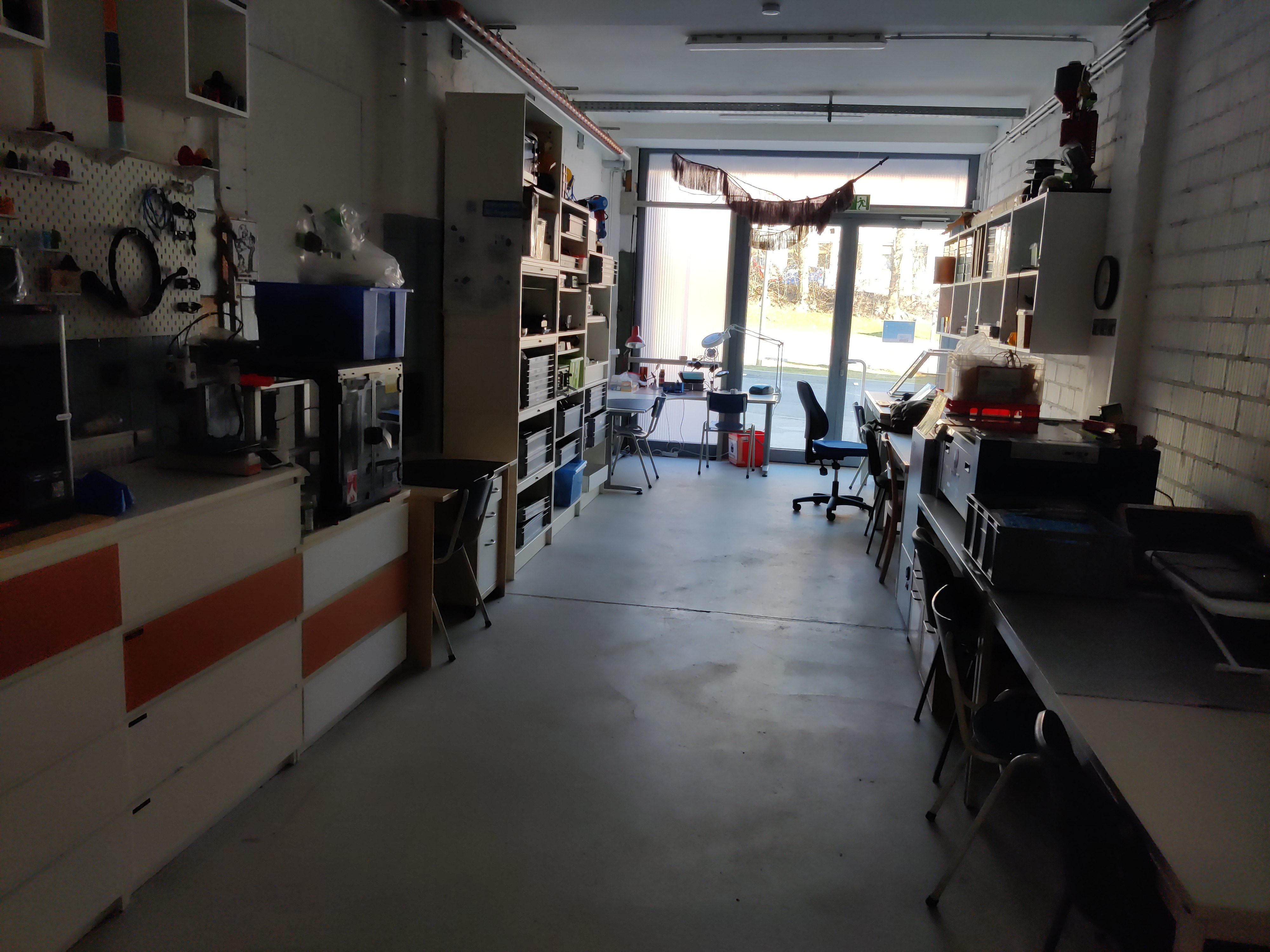 Various shelves with typical equipment for analyzing, repairing, and manufacturing electromechanical items