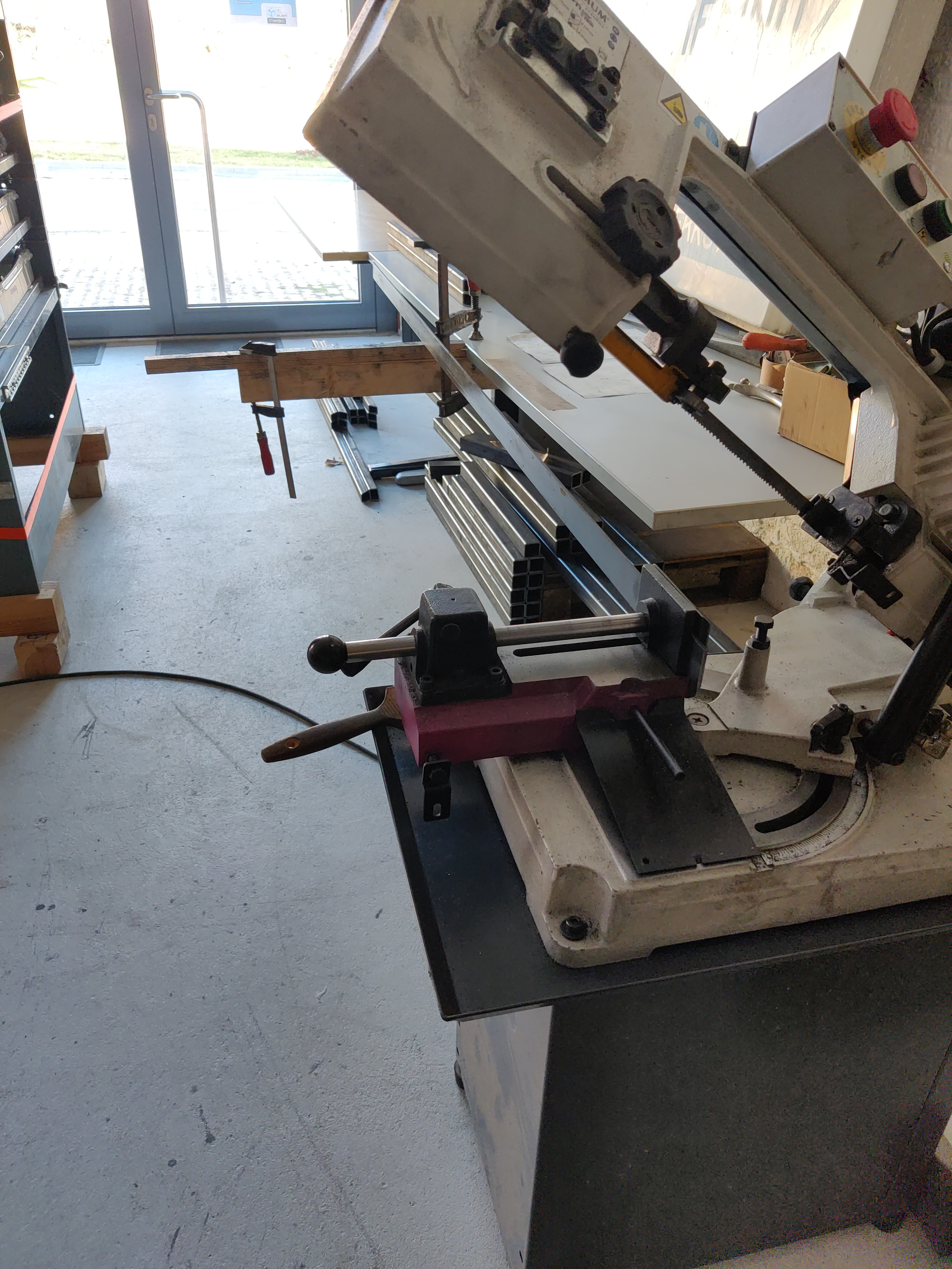 Shown here: Band saw, lots of material for frame construction